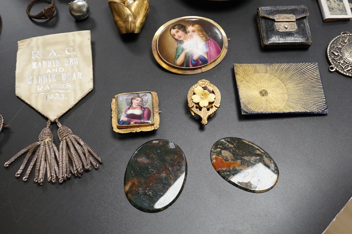 Objects of vertu and medals, including two Paris porcelain painted brooches, a leather cased almanac for 1827 and a painted ‘I Love You’ metal patch box